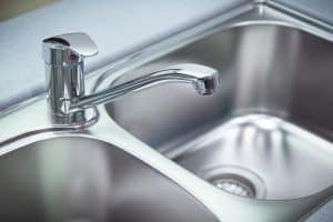 chrome tap and washbasin